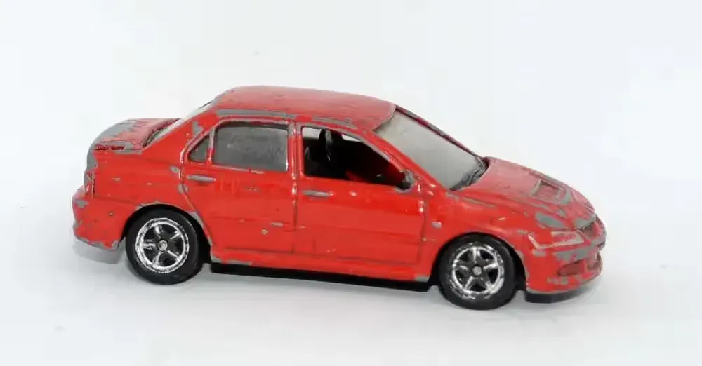 Model Resorak Auto Mitsubishi Lancer Evolution VIII 1:60 Welly diecast — praca twórcy RIIDII na Freshwall Marketplace