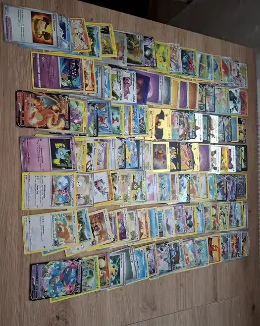 Zestaw kart Pokemon Orginalne +dwa albumy — praca twórcy edyta na Freshwall Marketplace