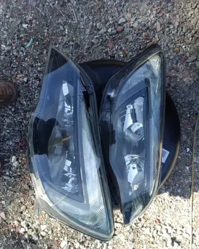 Sprzedam lampy uszkodzone opel astra J Europa 150zł tel 693375534 — praca Dariusz, Poręba