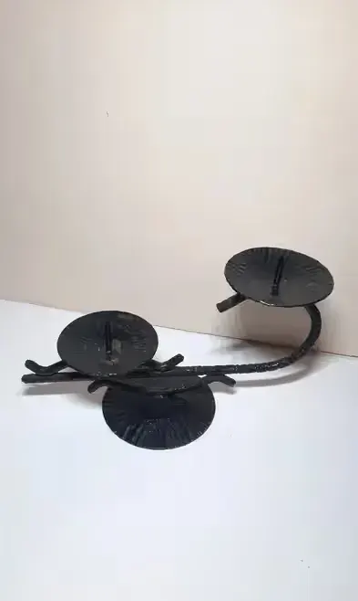 Świecznik metalowy — praca Janek, Toruń